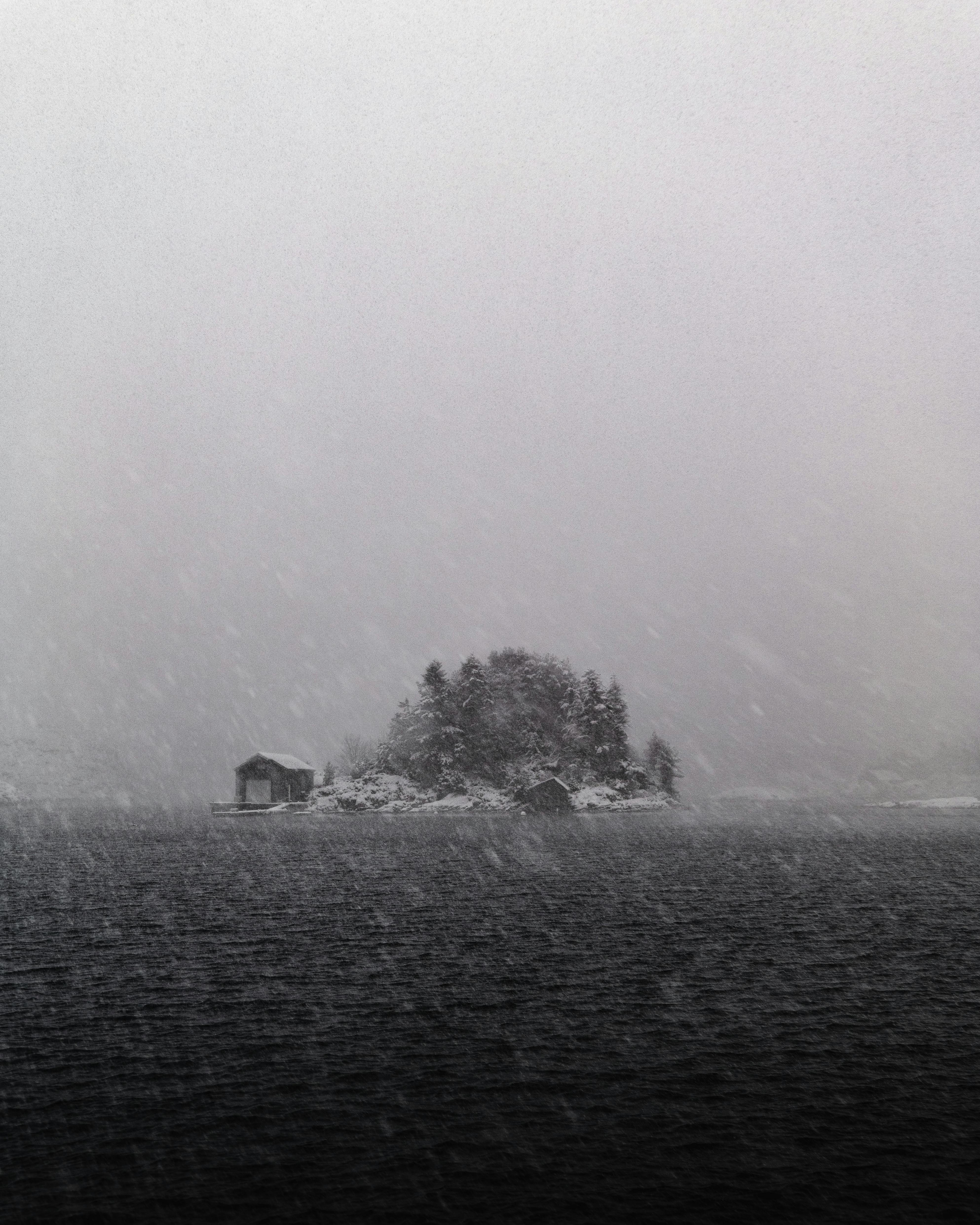 Snowstorm over a remote island in Vestland, Norway, with frosty weather and serene landscape.