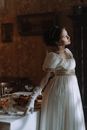 Close-up Photo of Woman in White Dress