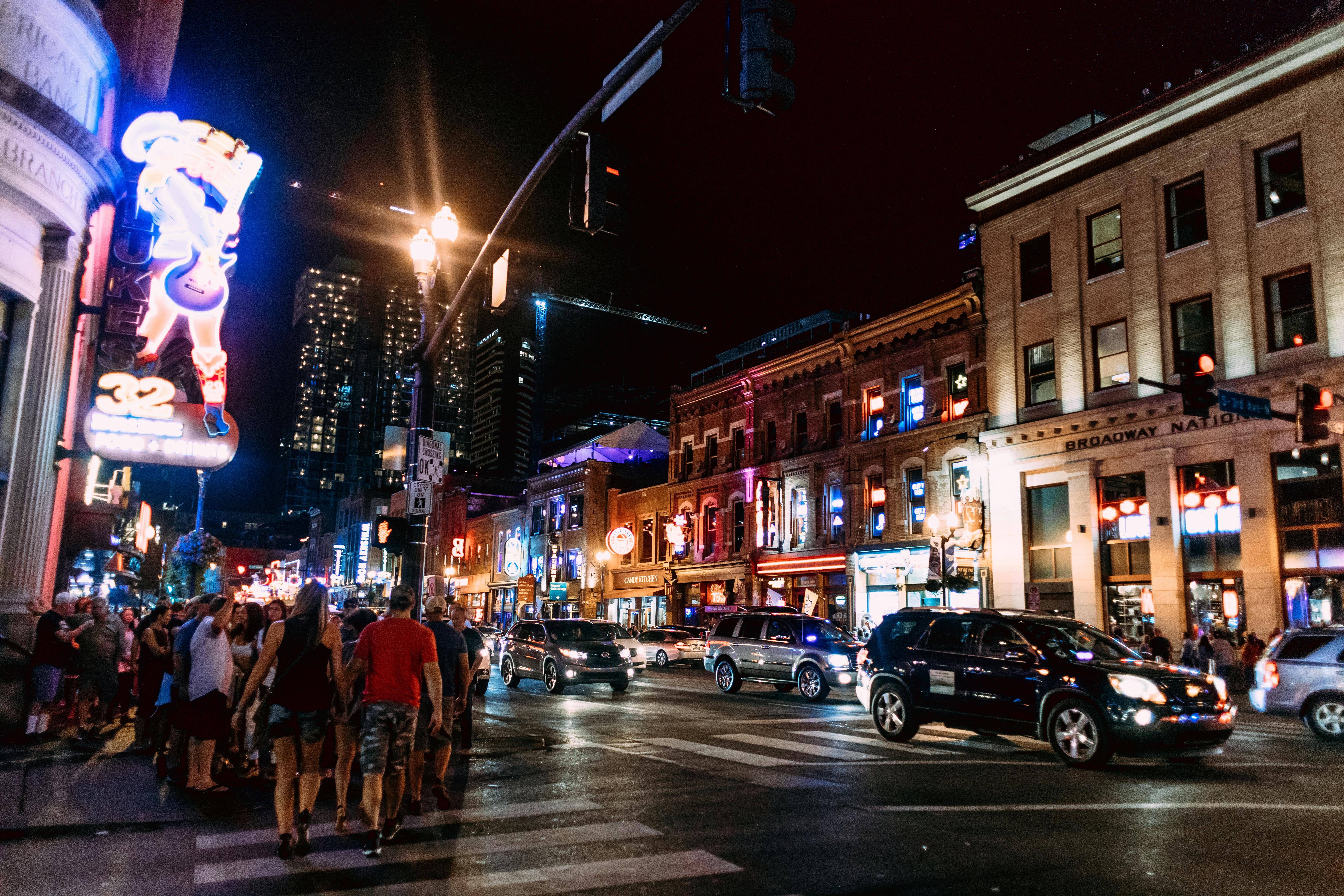 illuminated busy street at night