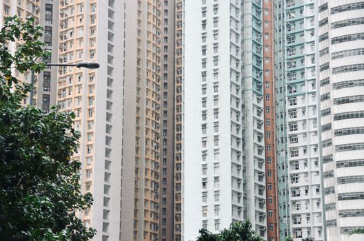 Urban skyline featuring high-rise residential buildings in Hong Kong.