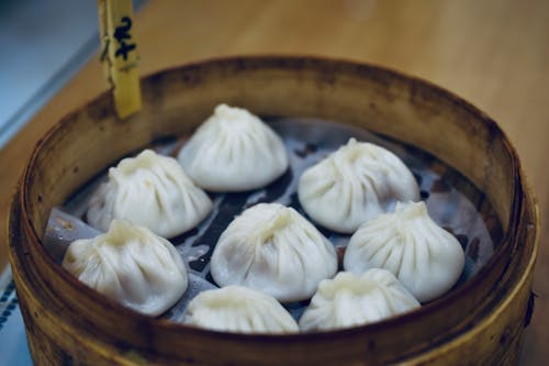 Free Steamed Dumplings in the Bamboo Steamer Stock Photo