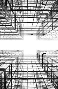 Symmetrical view of glass buildings in Hong Kong, showcasing modern architecture.