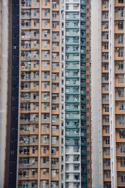Close-up of tall residential skyscrapers showcasing Hong Kong's dense urban housing.