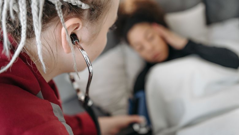 Checking a patient's vital signs