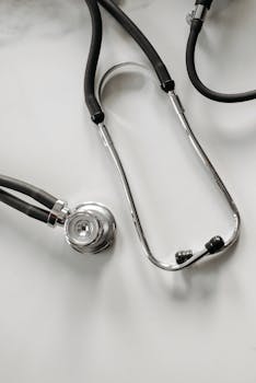 A detailed image of a stethoscope on a white background, ideal for healthcare themes.