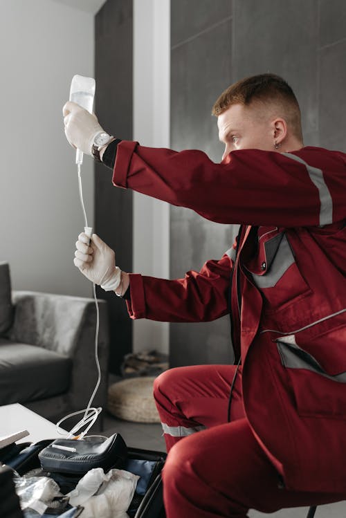 Man Holding A Dextrose