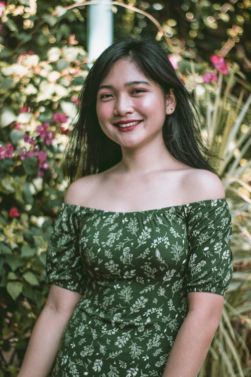 Teenage Girl Wearing Green Floral Dress
