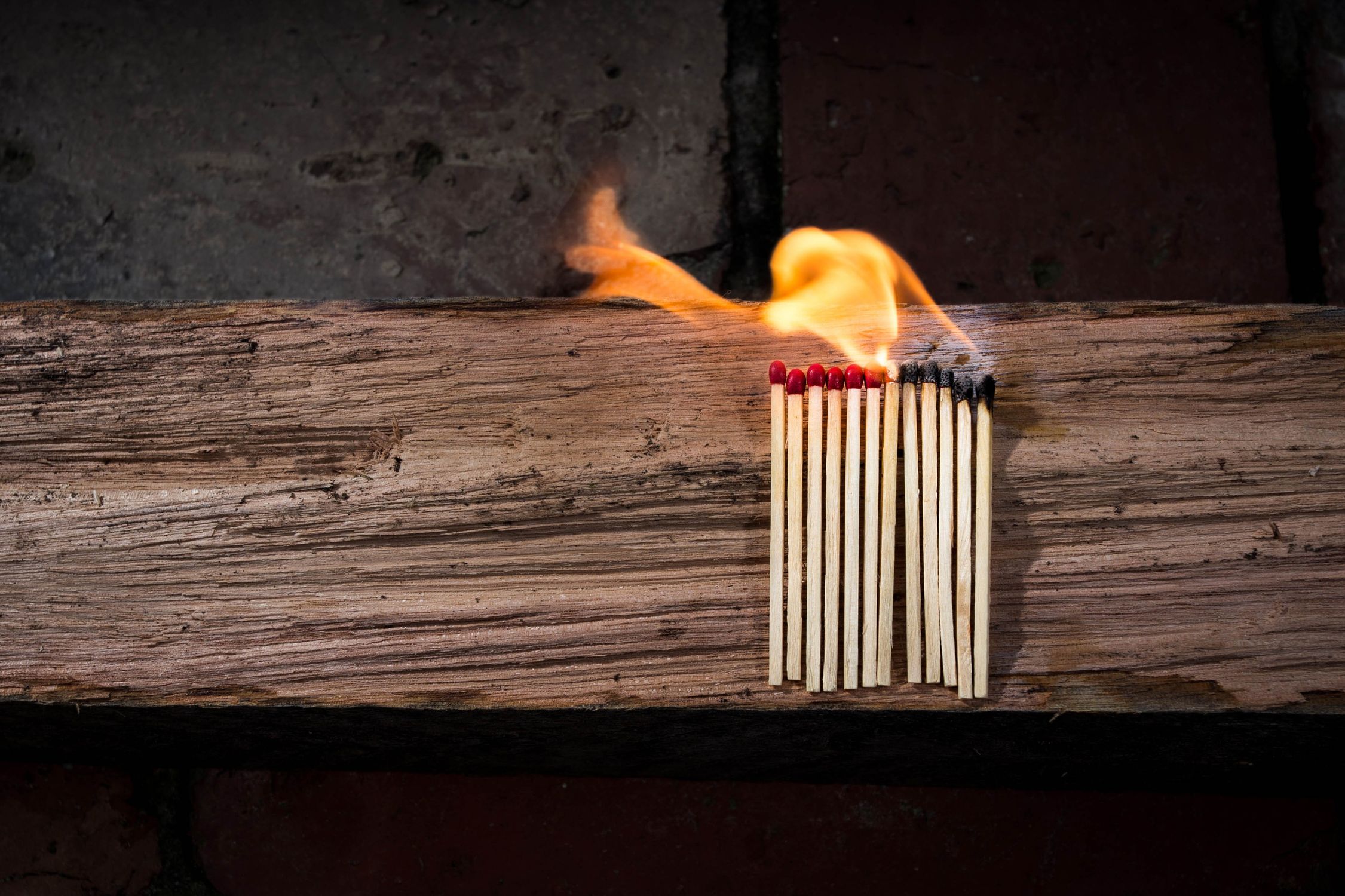 Lighted Matches On Brown Wooden Surface Free Stock Photo lighted-matches-on-brown-wooden-surface-free-stock-photo