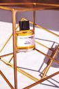 A Perfume on the Golden Steel Abstract Stand