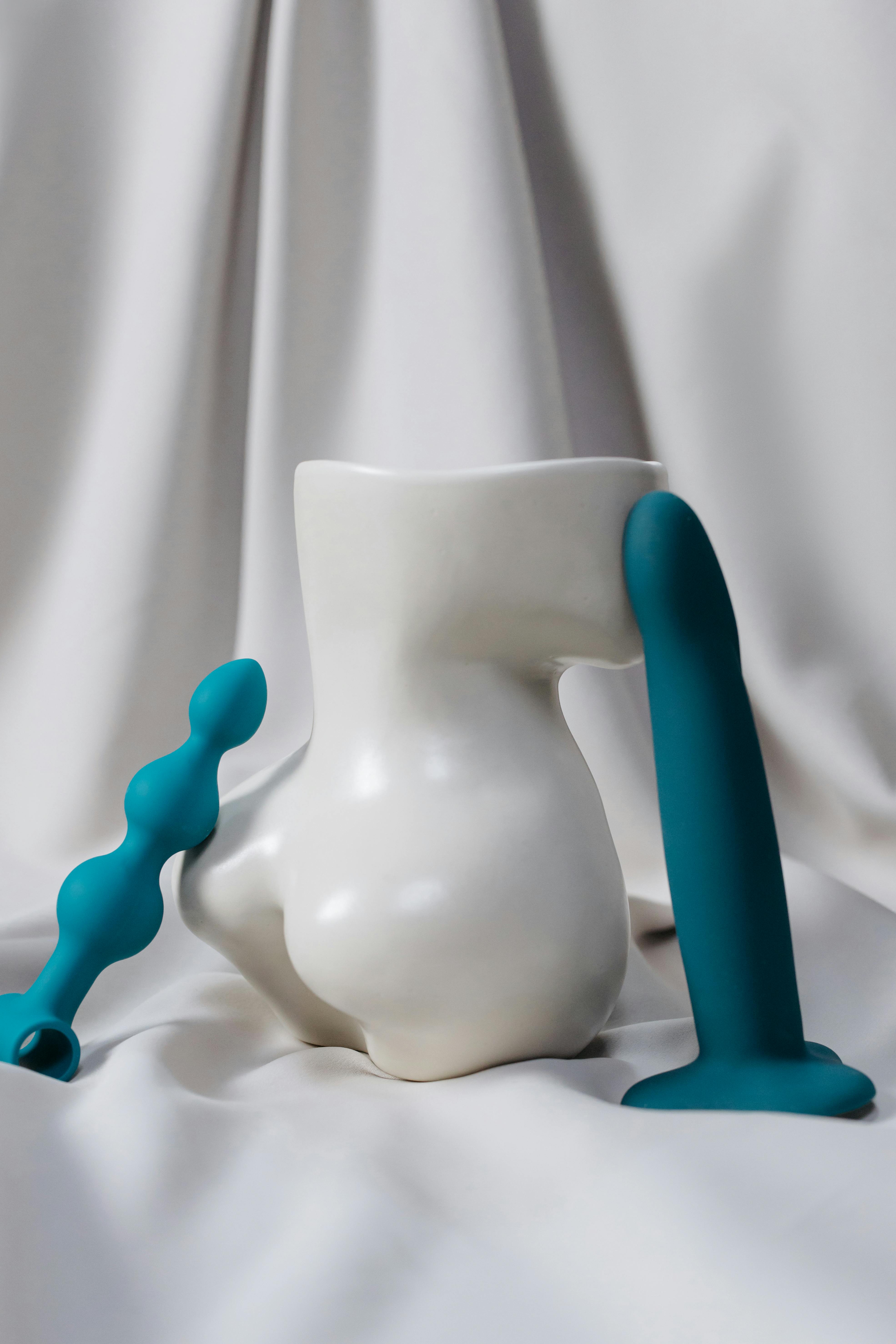 erotic toys next to a vase