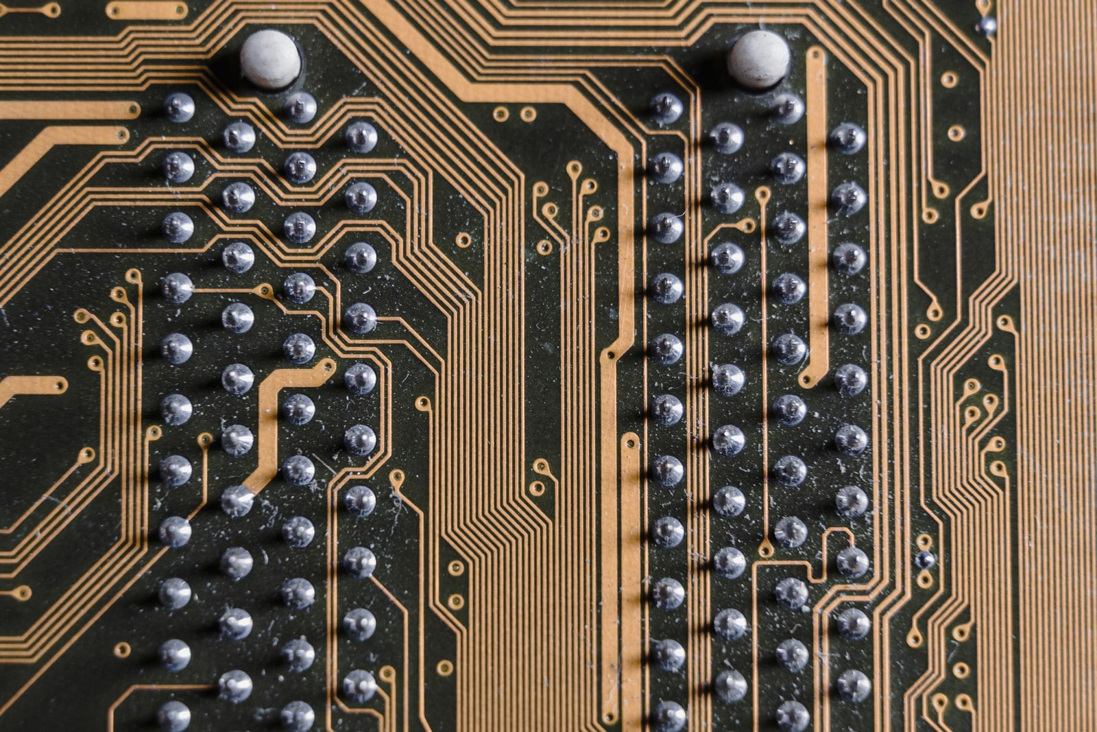Close-up of printed circuit board traces and solder points
