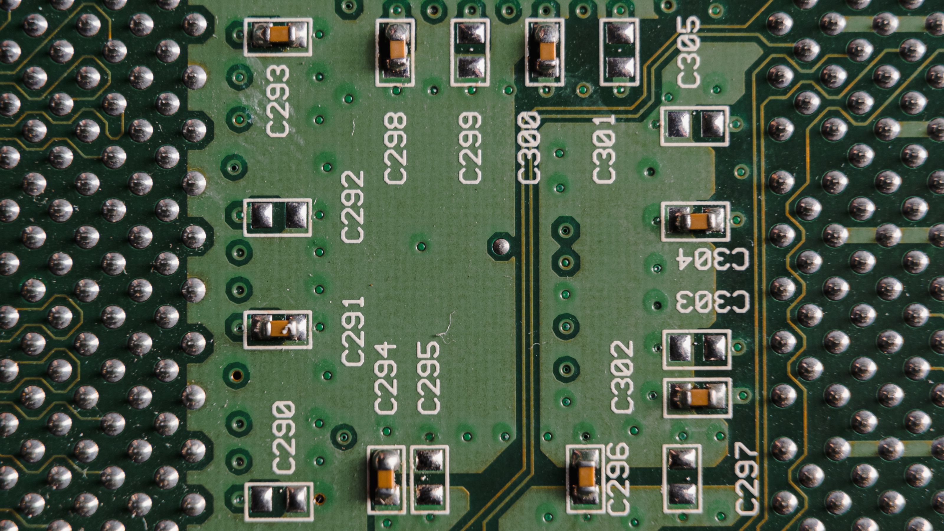 Close-up of a populated green printed circuit board