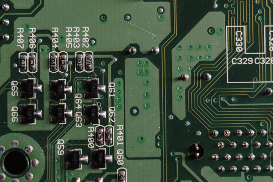 Detailed close-up view of an electronic circuit board with visible components and traces.