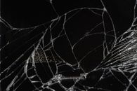 Close-Up Photo of Broken Mirror