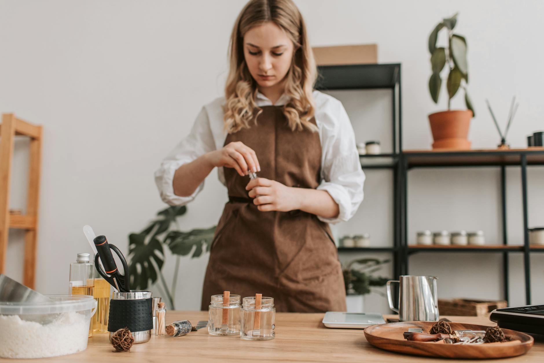 Woman Measuring Ingredients in Kitchen