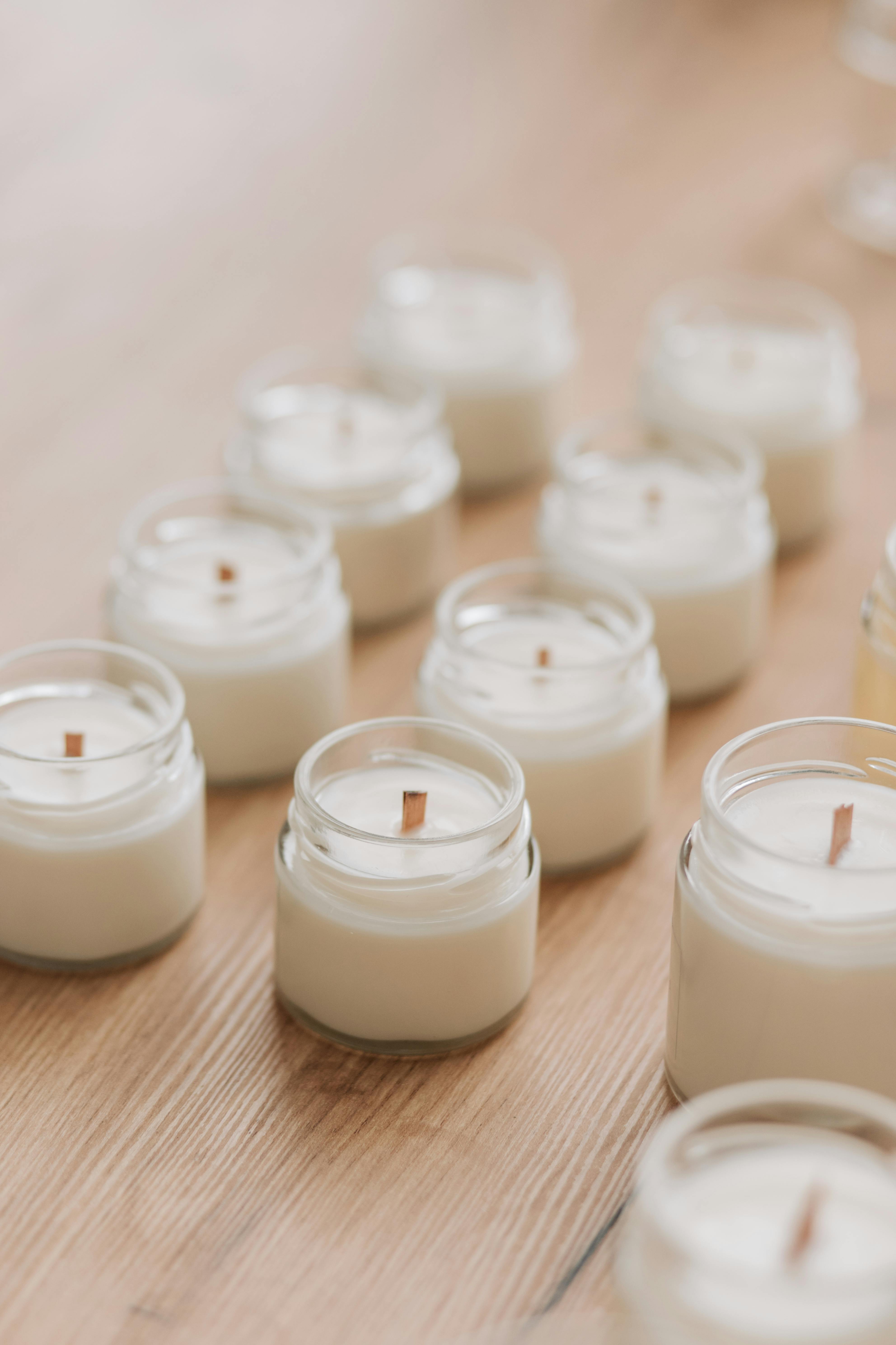 candles on glass bottles