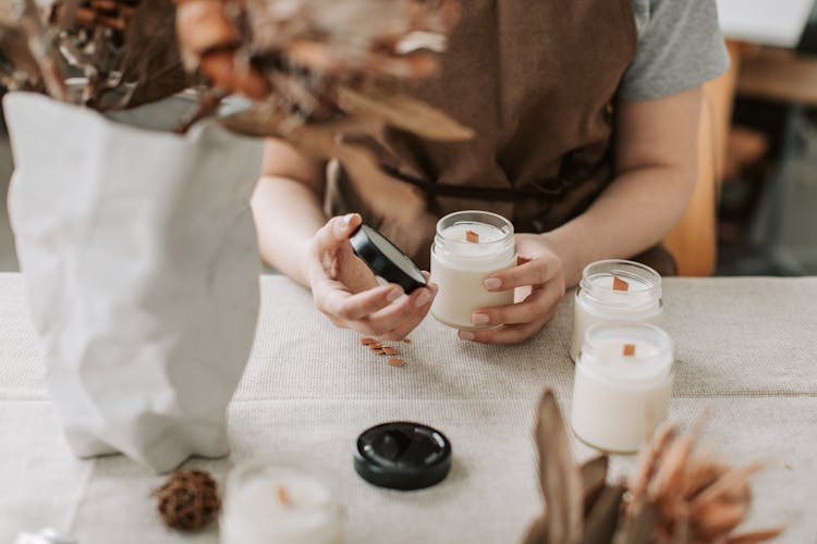 Woman Making Candles In Workshop