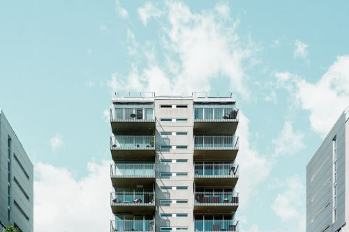 Free Contemporary residential building with balconies against a clear sky in Oslo, Norway. Stock Photo