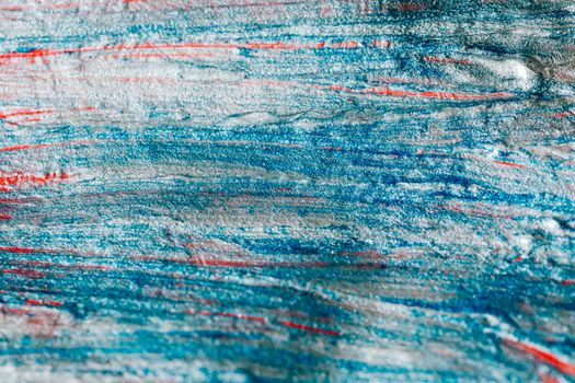 Capture of an abstract pattern showcasing vibrant blue, red, and white streaks.