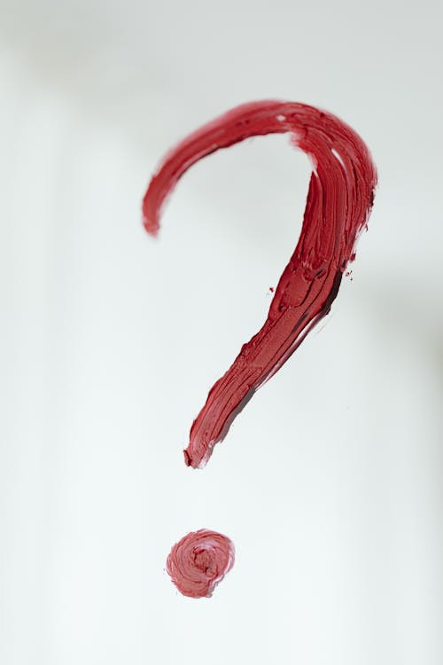 Free Red Paint on White Wall Stock Photo