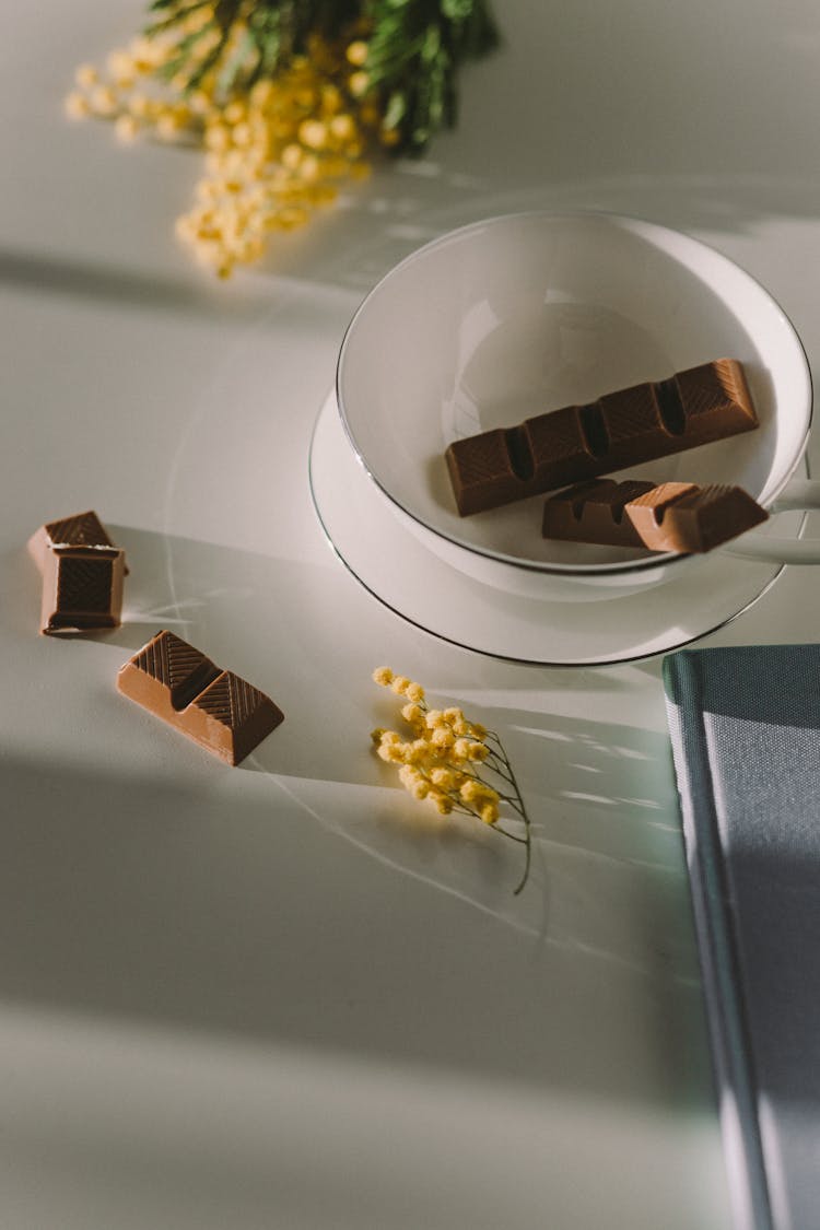 Chocolates In The White Ceramic Bowl