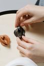 A Person Shaping a Clay