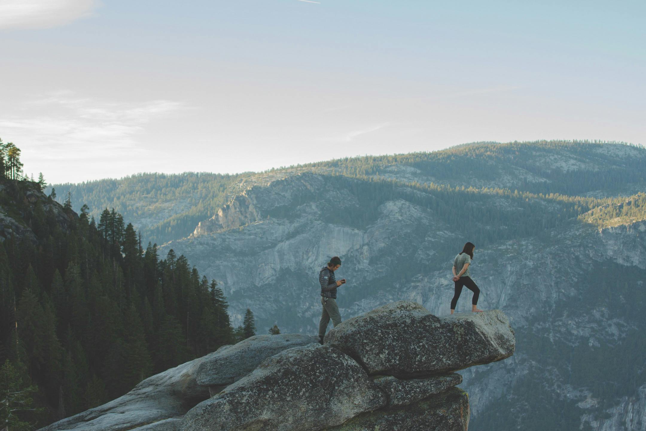 Person Standing on Top Of Hill · Free Stock Photo