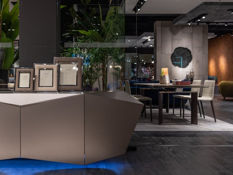 Modern Cupboard Near Table With Chairs