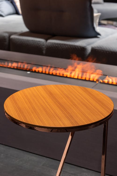 Free Table near fireplace at couch Stock Photo