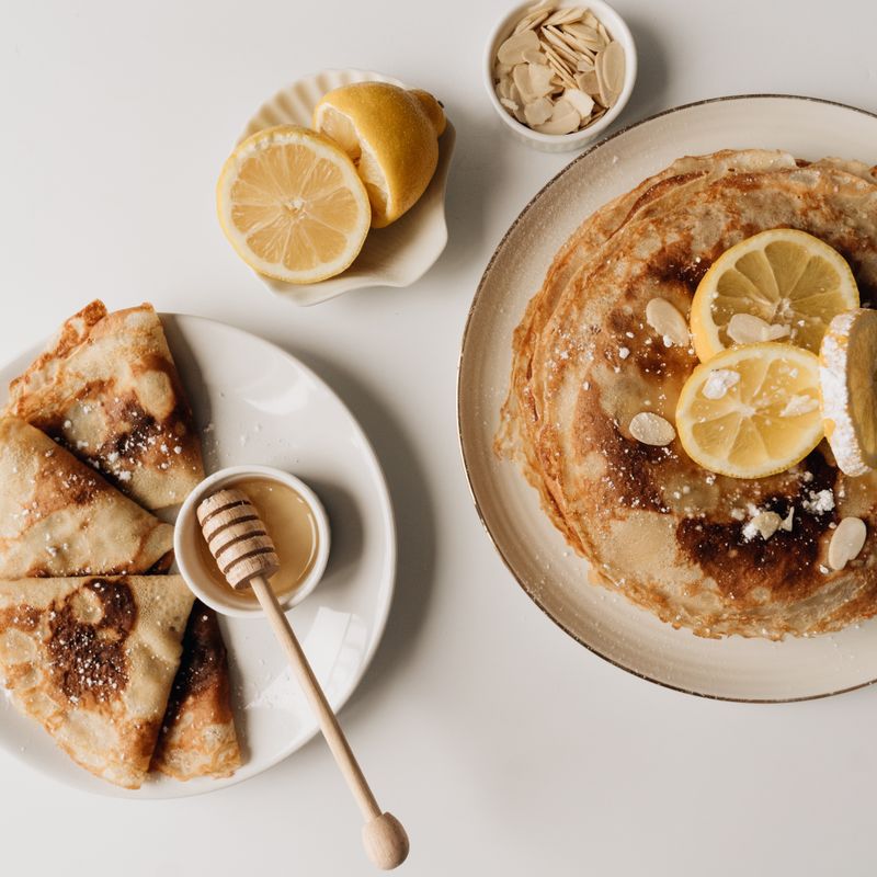Algerian Orange Blossom Semolina Pancakes with Honey Syrup and Toasted Almonds