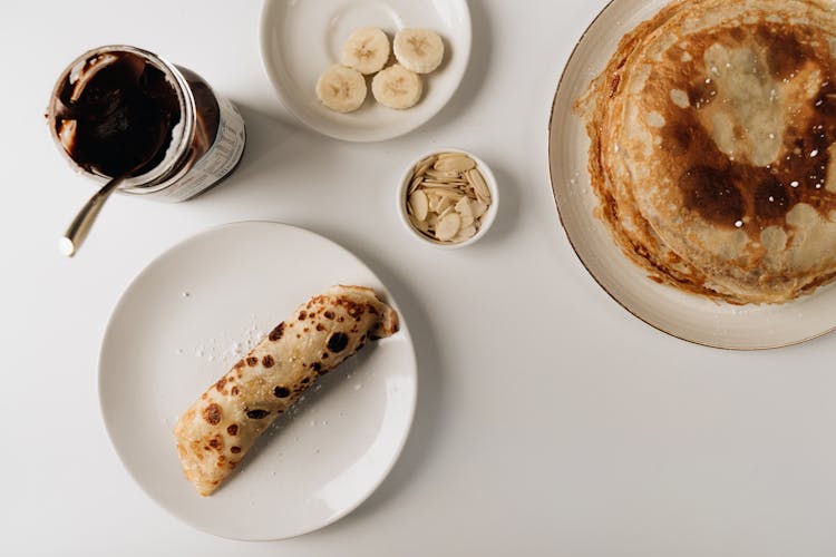 Pancakes With Banana Chocolate And Almonds