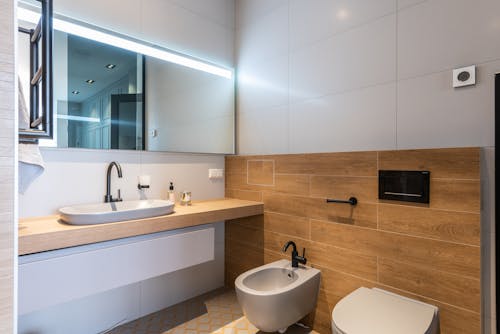 Interior of stylish bathroom with toilet