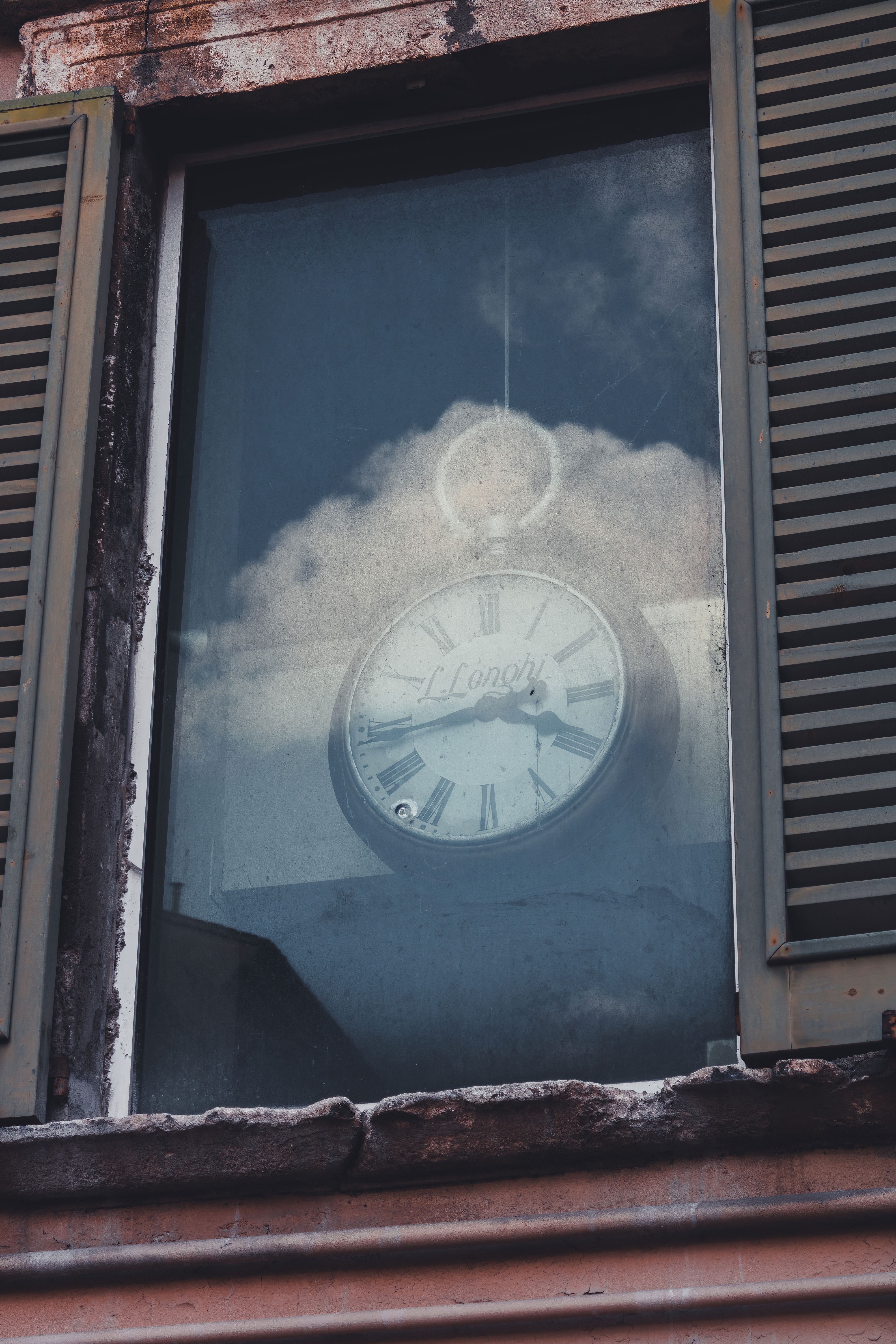 Wall Clock on Glass Window · Free Stock Photo