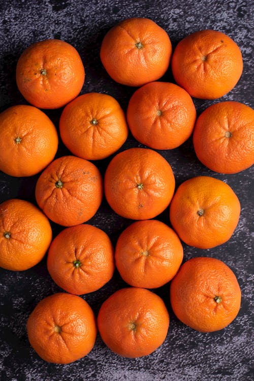 Orange Fruits on Gray Surface