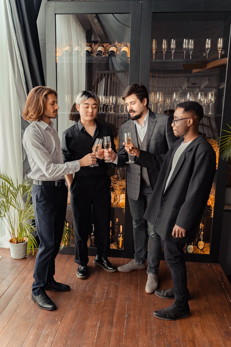 Group Of Friends Drinking Champagne Together