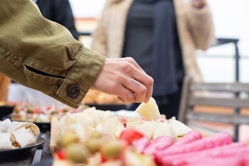 Free Person Holding a Finger Food Stock Photo