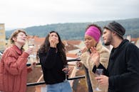 Friends Standing on the Roof Top
