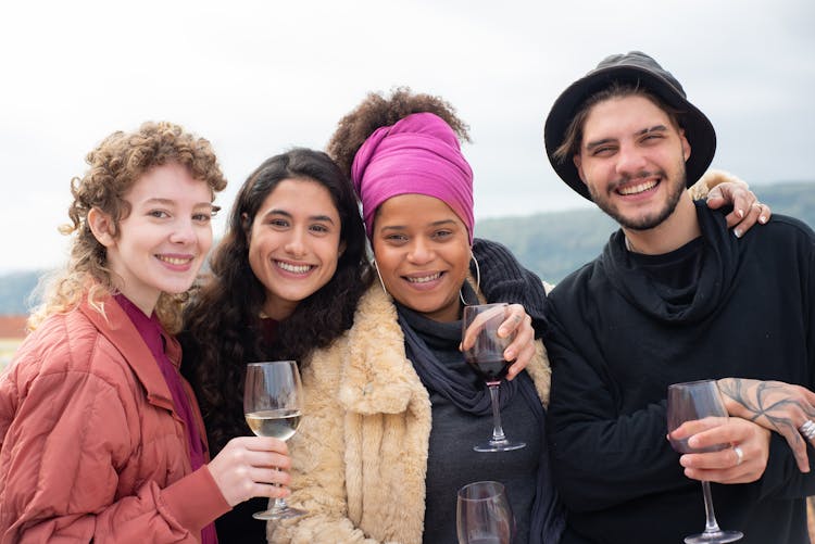 Group Of People Drinking Wine