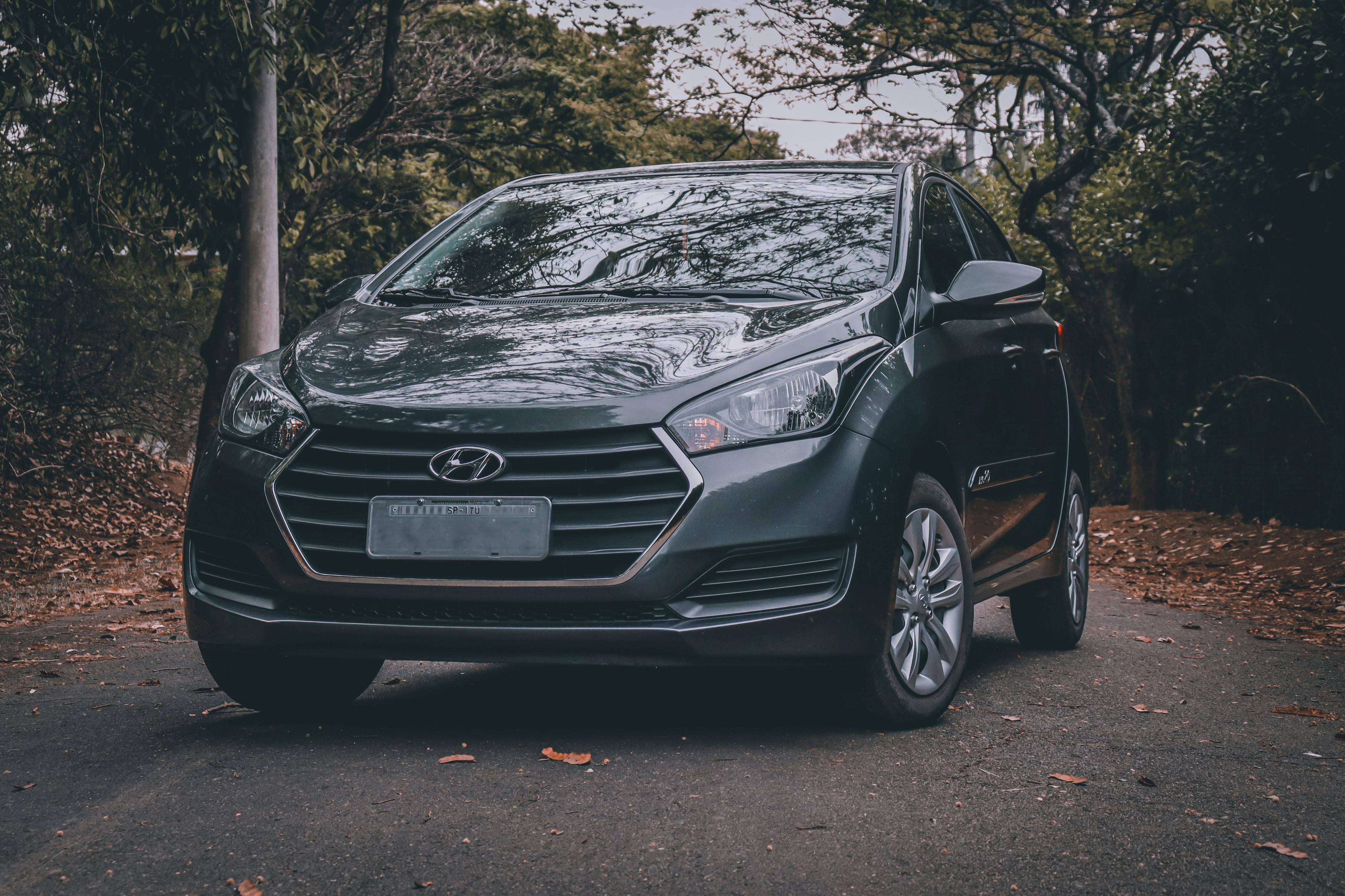 Free Black Hyundai Car Parked on the Road Between Trees Stock Photo