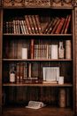 Books Arranged on a Wooden Bookcase