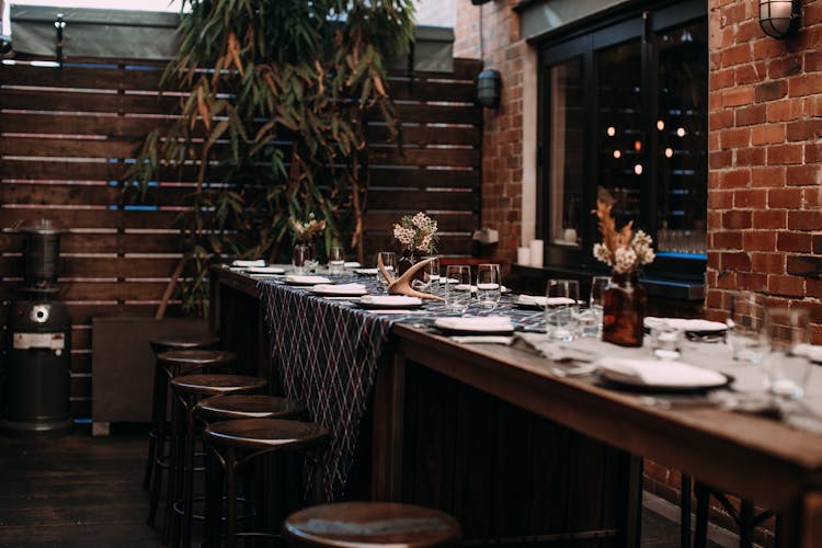 Wooden Table With Plaid Tablecloth