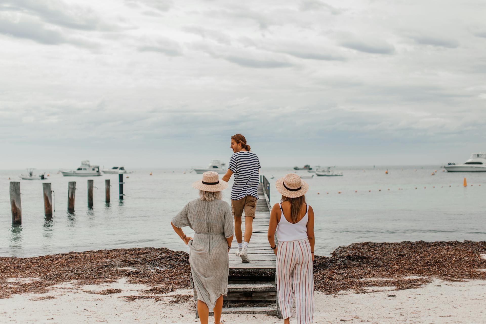 A Person Walking on a Wooden Dock