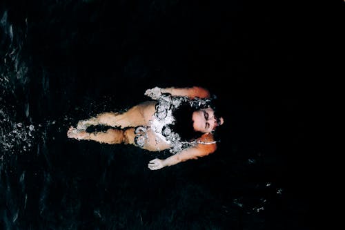Photo of a Woman Underwater