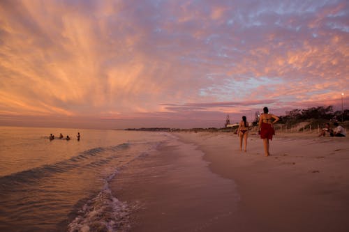 Women Walking on the Shore