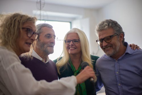 Free Elderly Friends Singing Together Stock Photo
