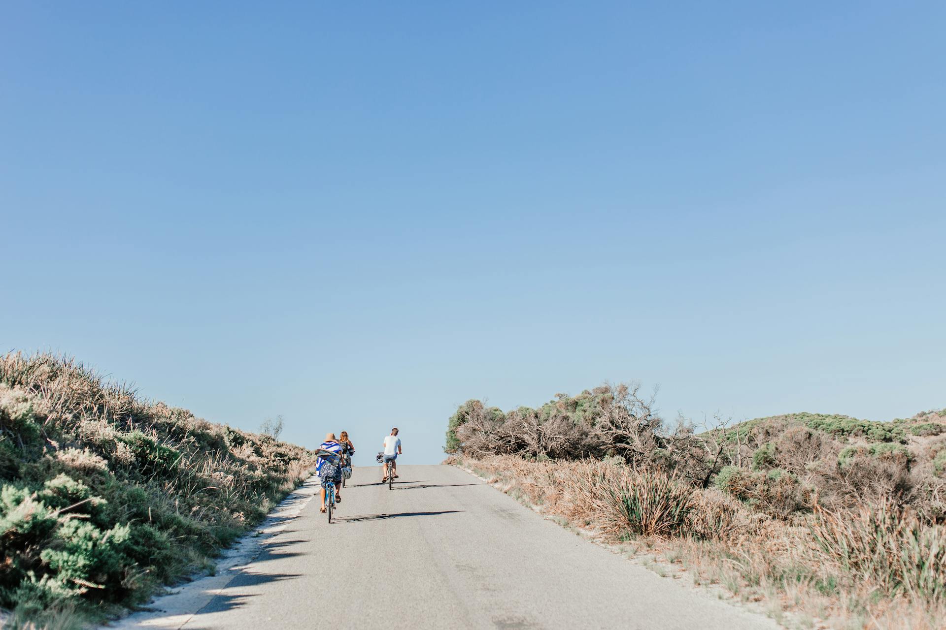 People Riding Bicycle on the Road