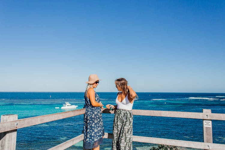 Women Standing On The Wooden Viewing Platform