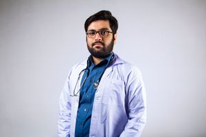 Doctor in a white coat with a stethoscope