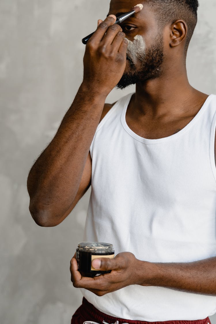 A Man Applying Face Cream