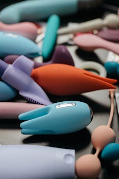 A vibrant assortment of sex toys showcasing a variety of shapes and colors.